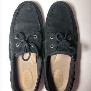 woman’s black Sperries